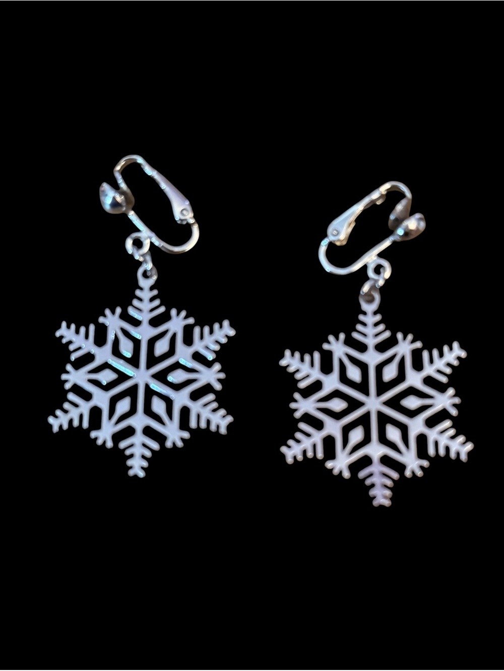 Vintage Avon 70’s silver tone snowflake clip on dangle earrings